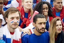 French football fans watching football match — Stock Photo