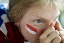 Closeup portrait of English soccer fan with hands on nose — Stock Photo