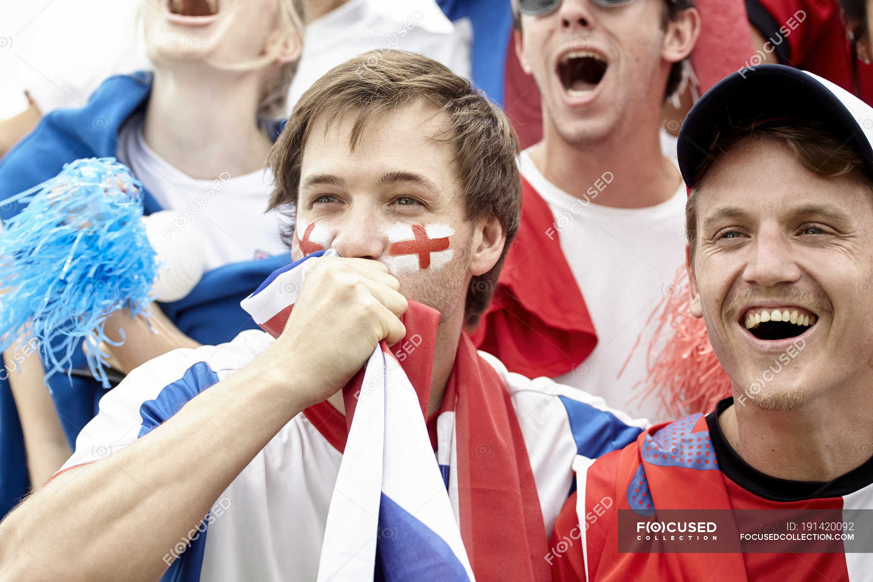 British football fans having fun at match — covering, joy - Stock Photo ...