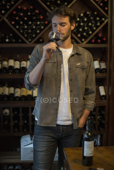 Sommelier sniffing glass of wine — Stock Photo