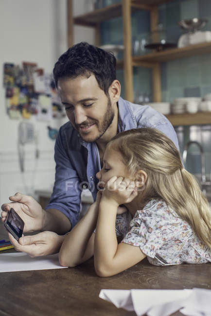 Father and daughter spending time at home together — Stock Photo