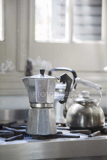 Close up of Coffee maker on stove — steel, indoor - Stock Photo ...