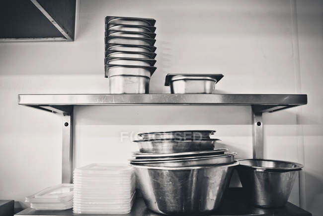 Close up of Mixing bowls stacked at kitchen prep station — Stock Photo