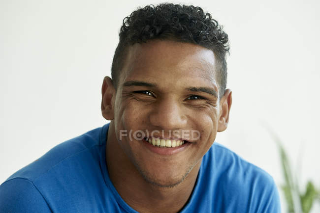 Portrait of smiling brazilian man — Stock Photo