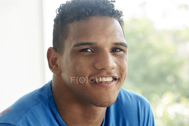 Portrait of smiling brazilian man — Stock Photo
