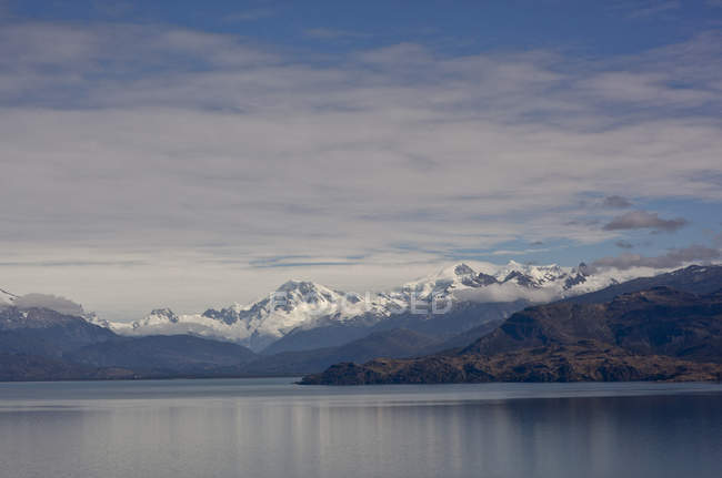 Landscape with mountains peaks and lake — Stock Photo