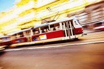 Czech tram riding down street — Stock Photo