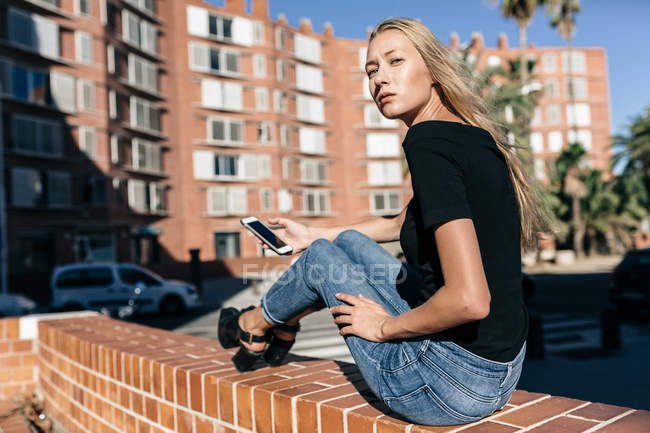 Girl sitting on floor — Stock Photo