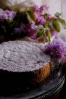 Chiffon Cake and fresh flowers — Stock Photo