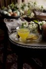 Ginger lemon honey tea in cup — Stock Photo