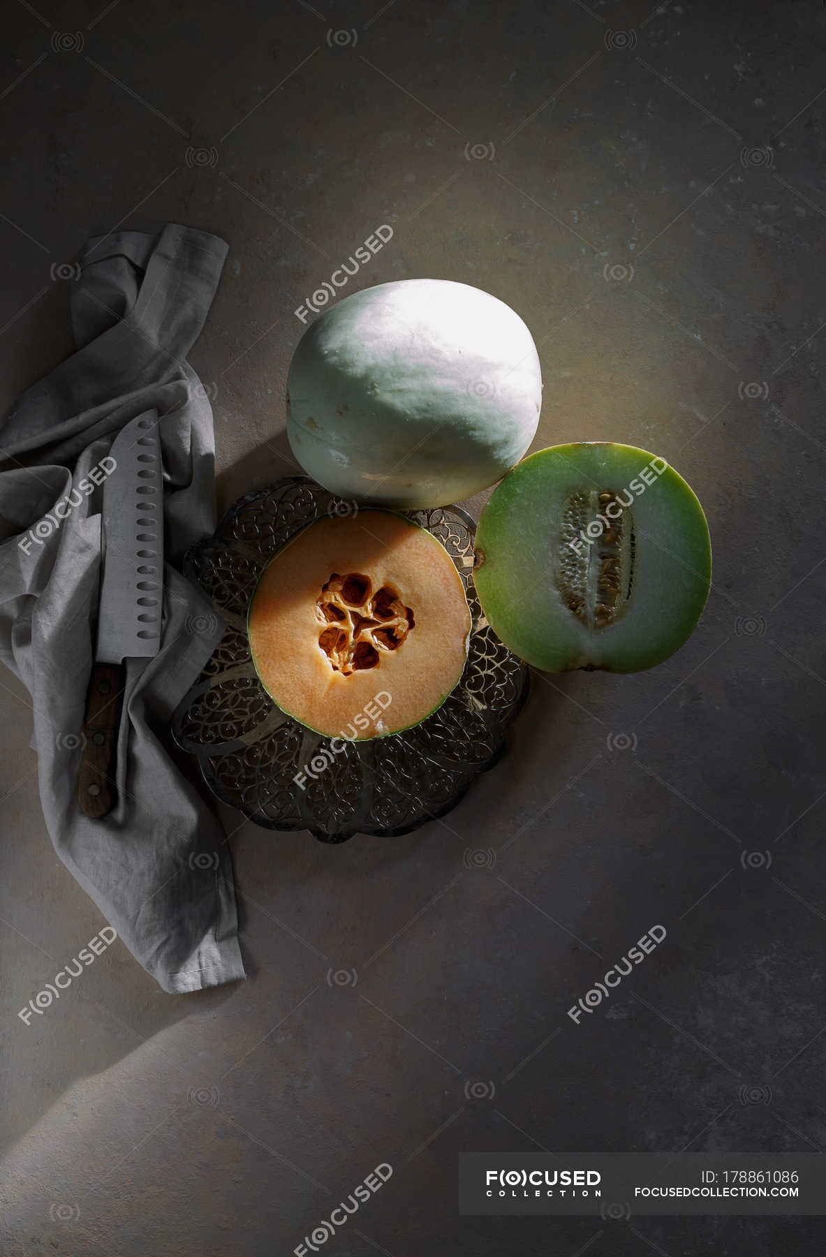 Fresh whole and halved melons — Healthy Eating, metal Stock Photo