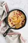 Baked oats with pear and lingonberries — Stock Photo