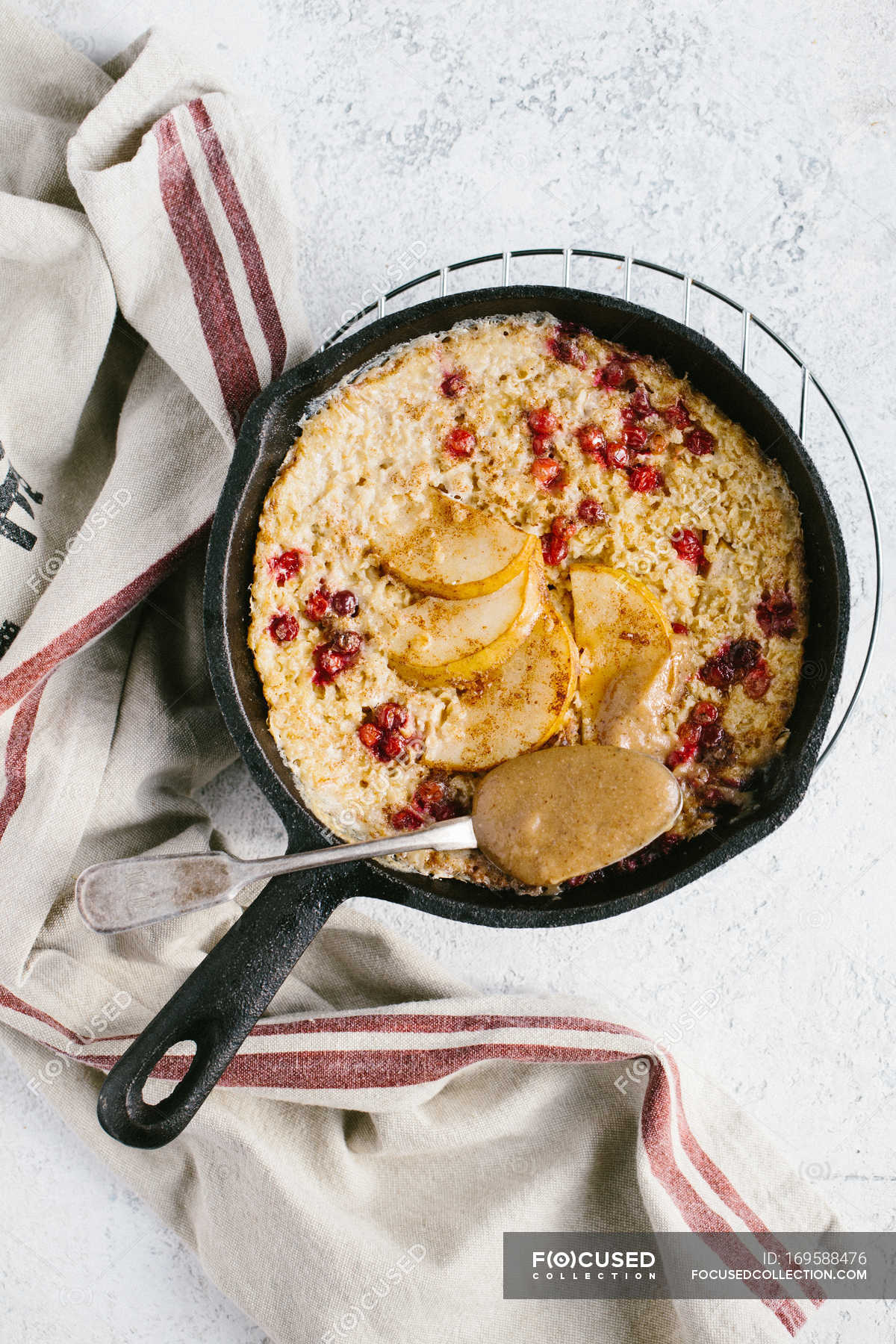Baked oats with pear and lingonberries — nutrition, cookery - Stock ...