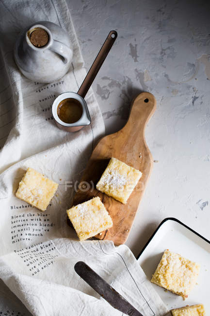 Lemon cottage cakes and jezve with cofee — Stock Photo