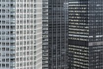Conceptual, close-up, full frame view of modern office buildings, Manhattan, NYC — Stock Photo