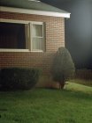 Crop exterior of brick house and lawn at front yard — Stock Photo