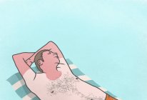 Sunburned man sleeping on towel — Stock Photo