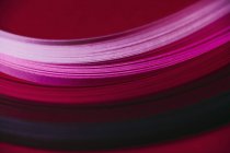 Modèle abstrait d'onde de papier rose et rouge — Photo de stock