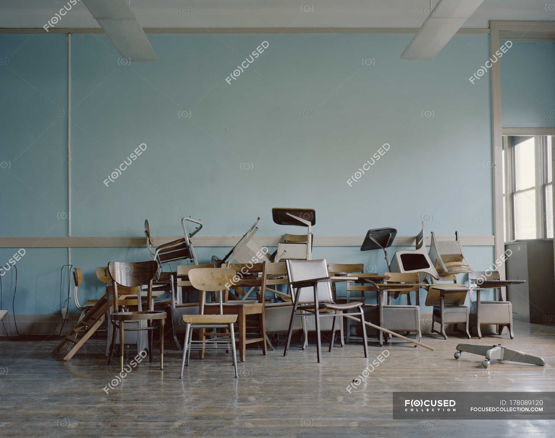 Pile Of Broken Chairs In Abandoned School Still Life Large