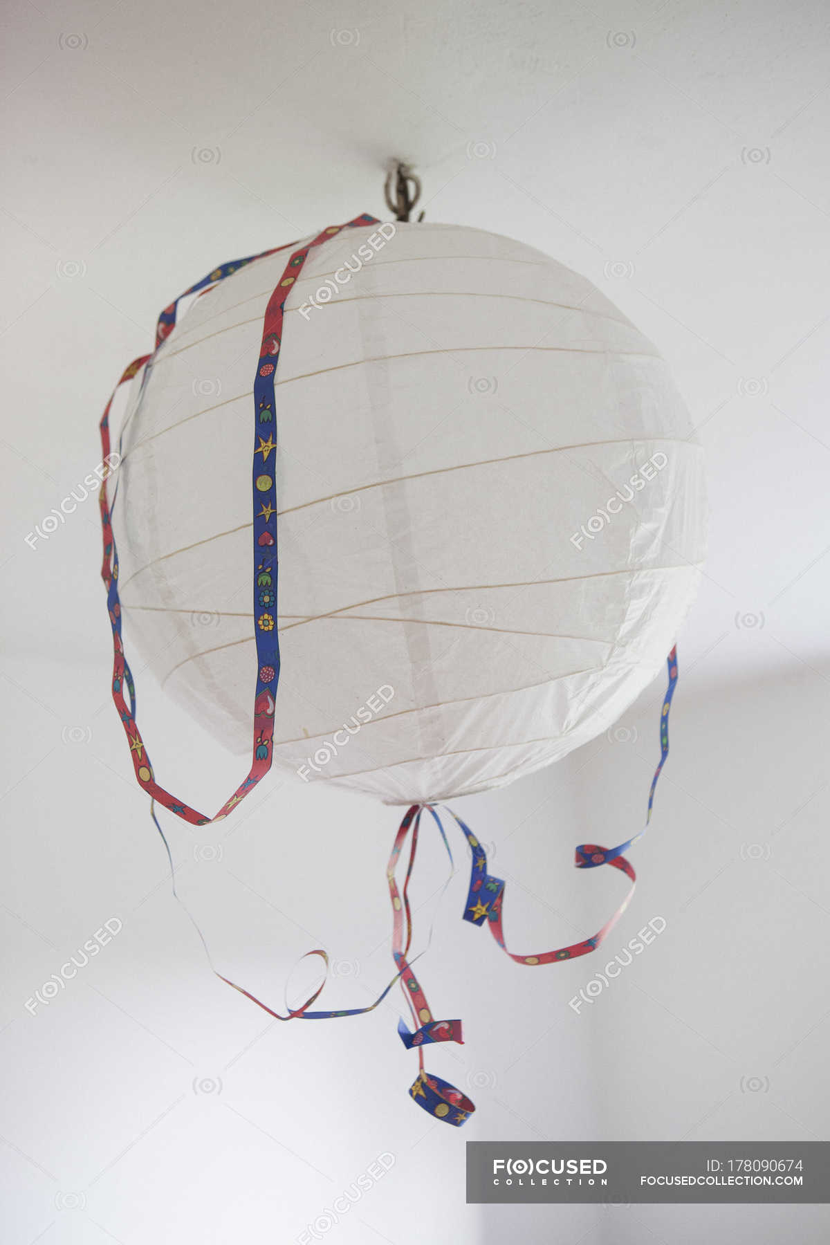 Close Up View Of Paper Lantern Hanging From Ceiling Copy Space