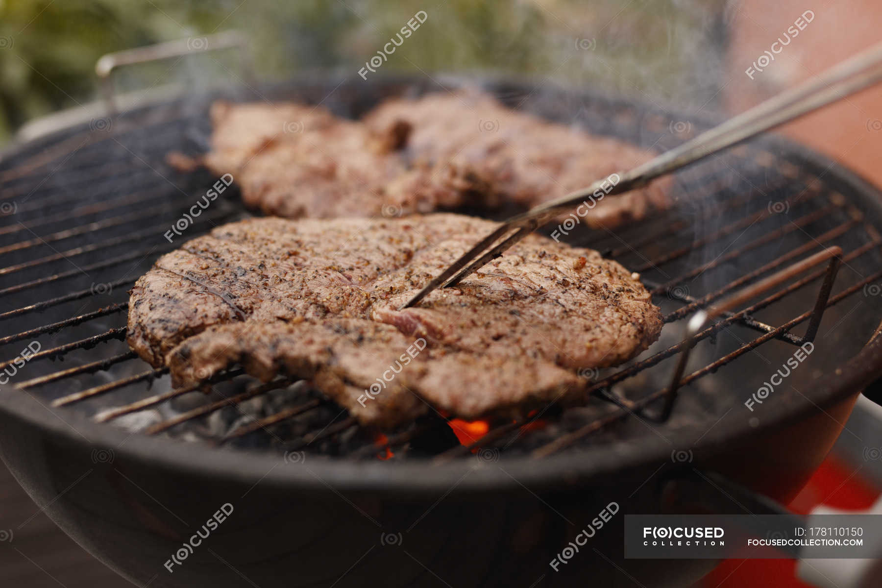 Steak Grilling On Barbecue At Patio Selective Focus Close Up