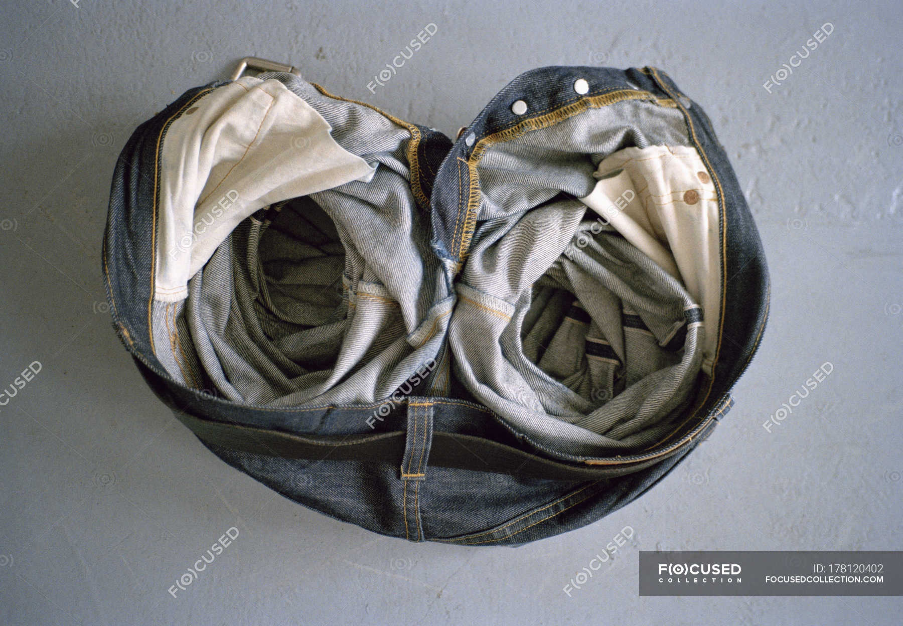 Directly Above Of Crumpled Jeans On Floor High Angle View Copy