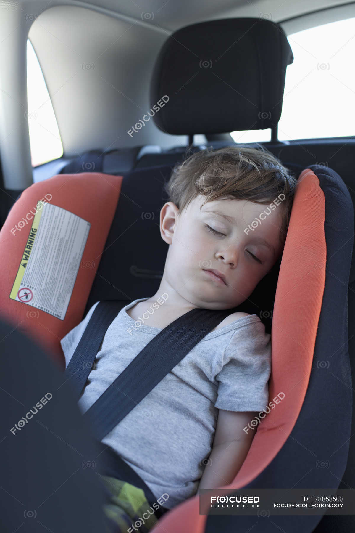 Cute Little Boy Sleeping In A Car Seat Brown Hair Child Stock Photo 178858508