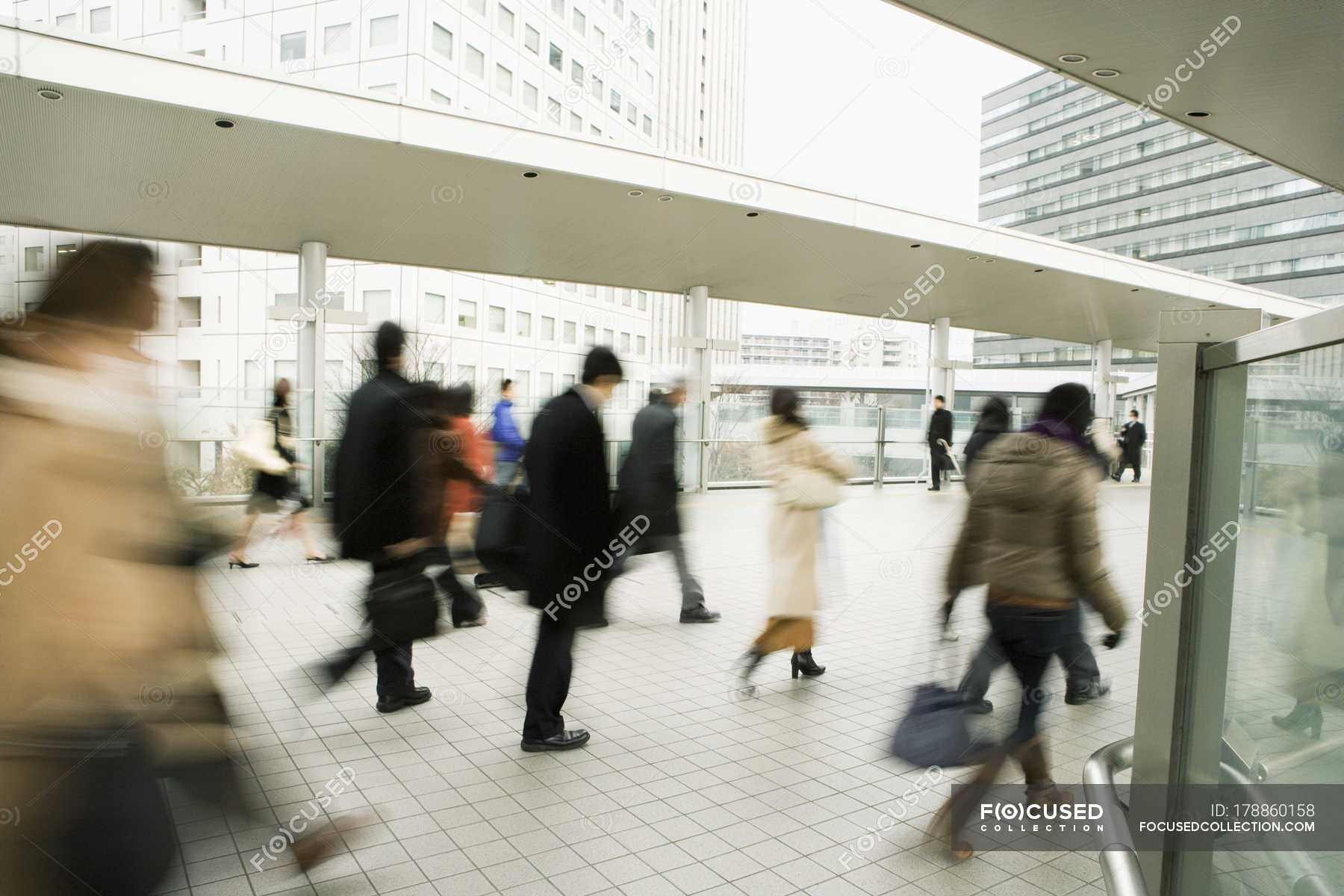 blurry people walking