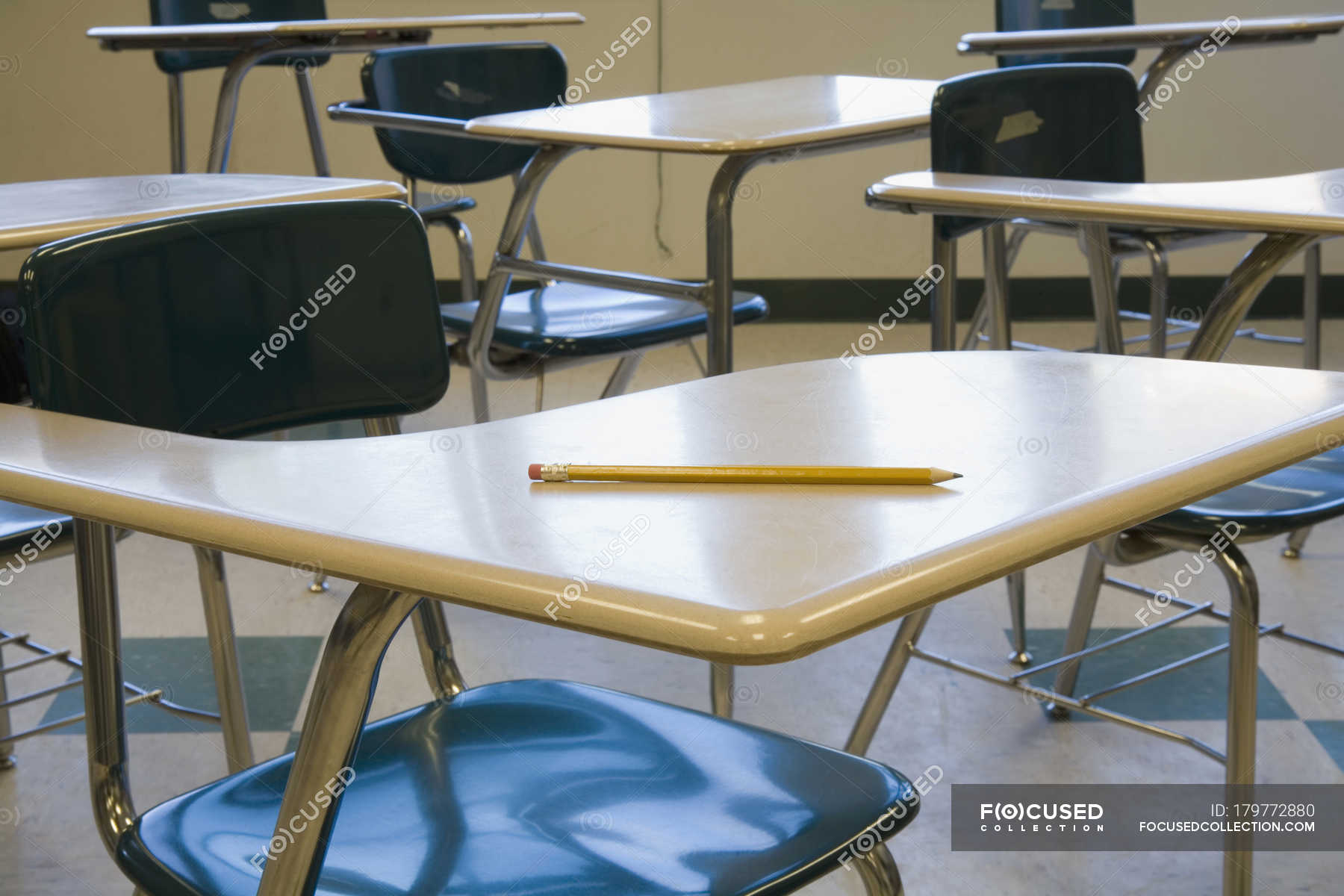 Pencil On Desk At Empty Classroom Secondary School Building