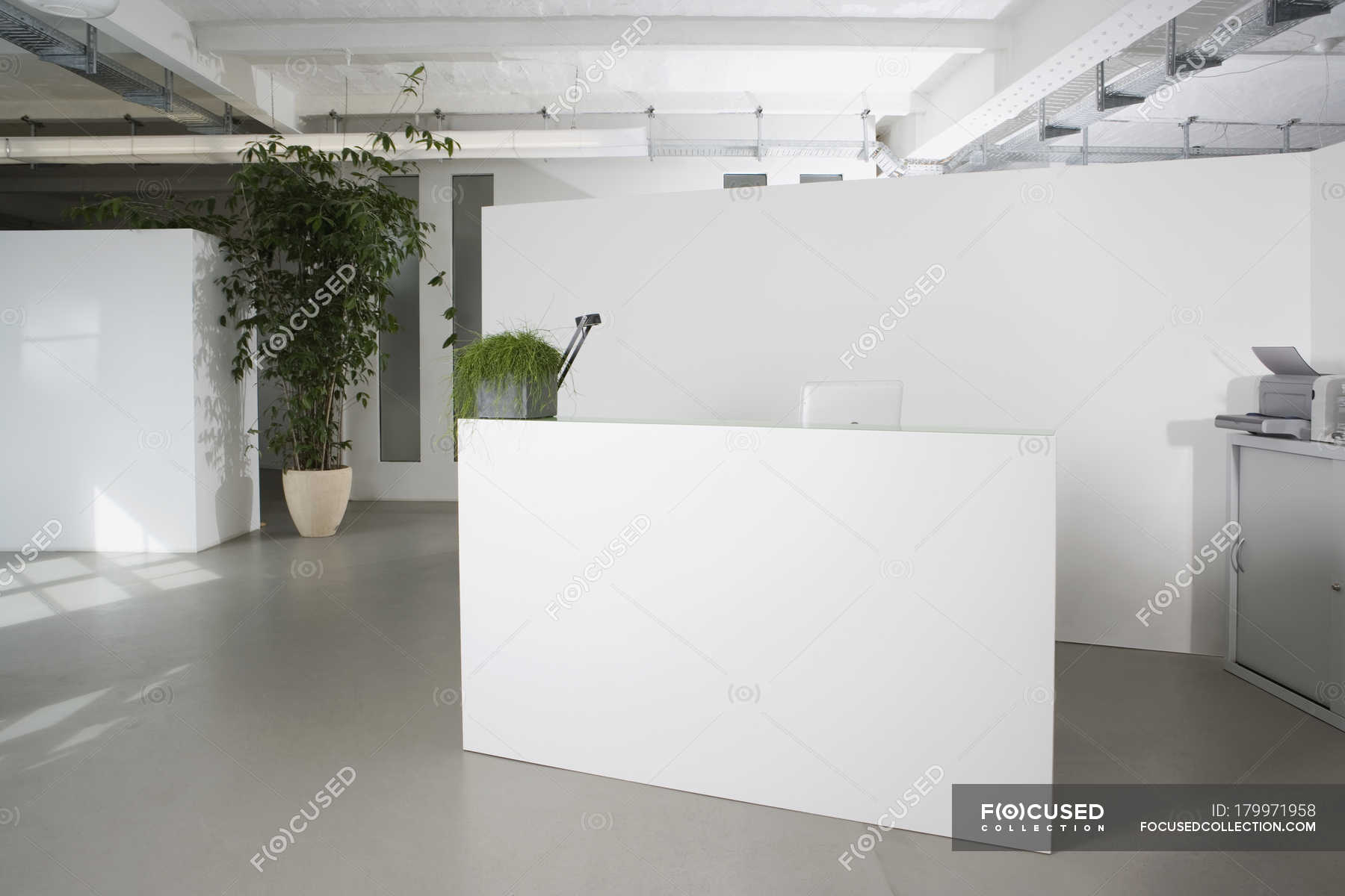 Reception Desk In Foyer Of Office Building Copy Space Computer