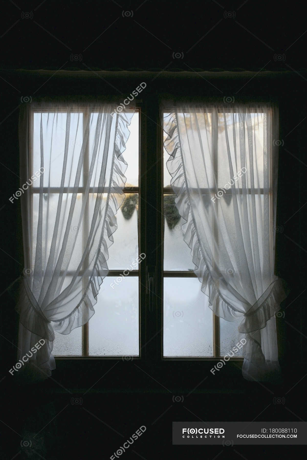 Fog Behind Rural Window With Curtains Shadow