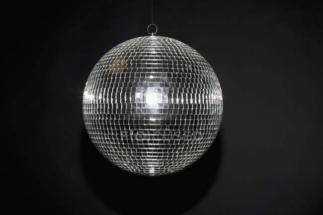 Close up view of shiny disco ball on black background — reflection, Single  Object - Stock Photo | #177266070