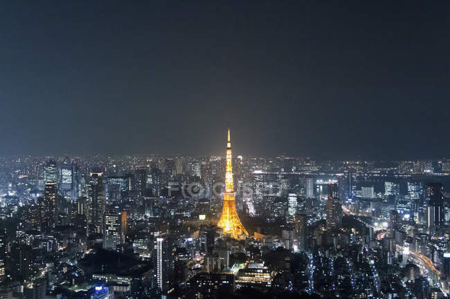 Aerial View Of Illuminated Tokyo Tower Amidst Cityscape At Night Communications Tower Architecture Stock Photo