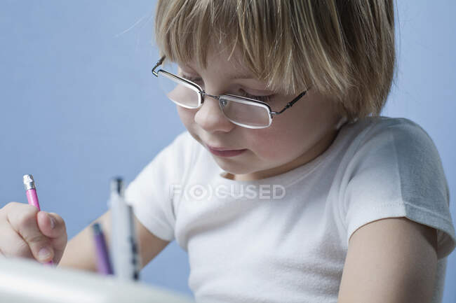Boy doing homework, close-up — Stock Photo