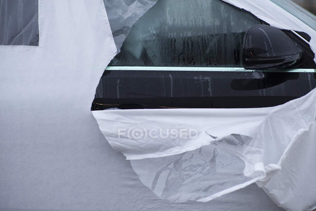 Close up view of torn cover on car — Stock Photo