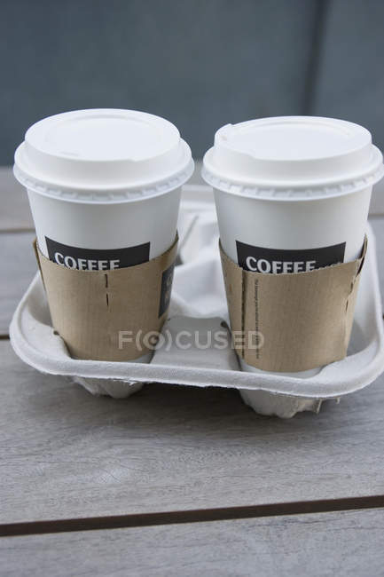 Close up view of two disposable coffee cups — Stock Photo