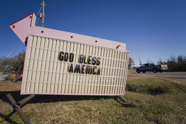 Bigboard God Bless America lettering at roadside — Stock Photo