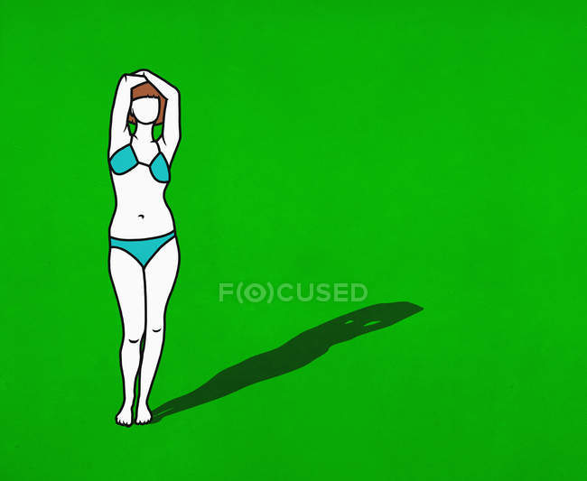 Porträt selbstbewusste Frau im Bikini auf grünem Hintergrund — Stockfoto