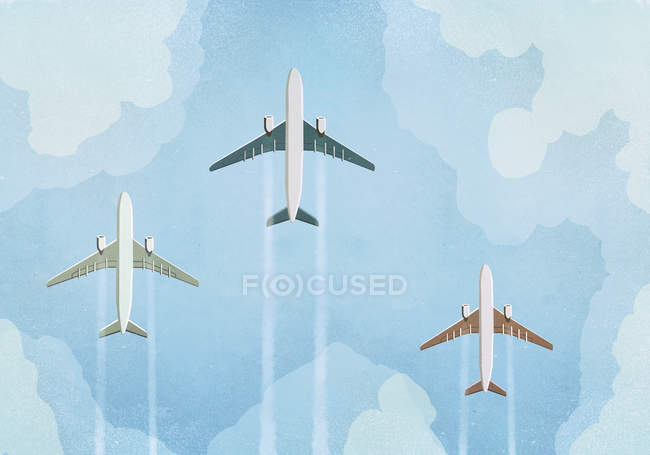 Vista ad angolo basso di tre aeroplani che volano nel cielo — Foto stock