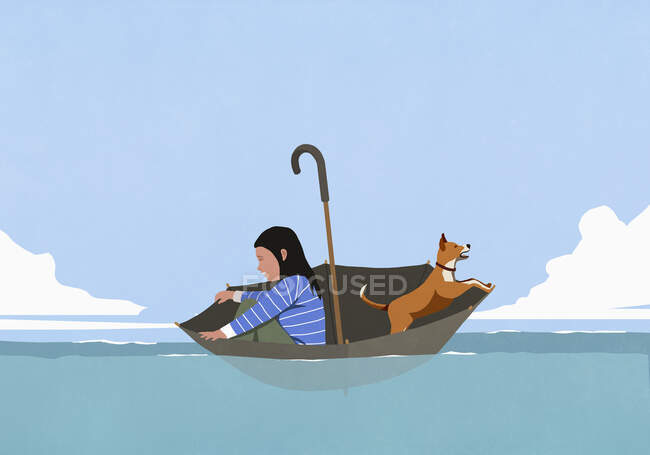 Donna e cane in ombrello galleggianti sul mare — Foto stock