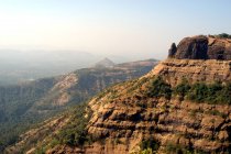 View of hills of Matheran a hill station in Maharashtra, India. It is the tiniest hill station in the country. It is located Western Ghats range, India — Stock Photo