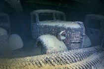 Trucks inside Hoki Maru shipwreck — Stock Photo