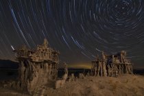 Star trails and sand tufa formations — Stock Photo