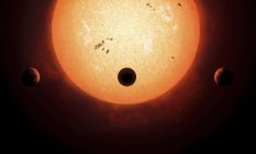 Три планеты вокруг звезды — стоковое фото