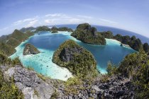 Rugged limestone islands around lagoon — Stock Photo