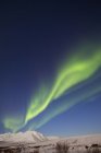 Aurora boreal sobre montanhas Ogilvie — Fotografia de Stock