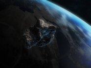 Астероид вблизи планеты Земля — стоковое фото