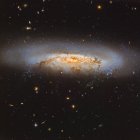 Virgo Cluster galaxy NGC 4522 in true colors in high resolution — Stock Photo