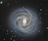 NGC 4921 galaxia espiral barrada en el cúmulo de Coma - foto de stock