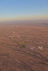 Arizona, Mesa - April 6, 2013: Extra 300 aerobatic aircrafts flying in formation during APS training — Stock Photo